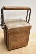 An early 20th Century stained pine container, of dove tailed construction with two carry handles,