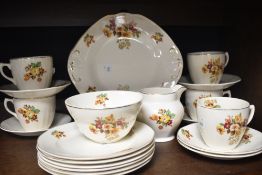 A vintage part dinner/tea service having autumnal decoration, comprising nineteen pieces