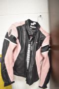 A ladies pink and black leather motorcycle jacket by Richa, size 8