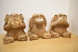 Three modern imported wood figures of the Three Wise Monkey's, standing at 30cm tall.