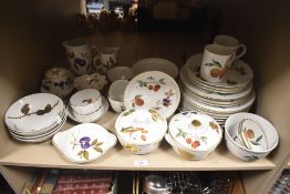 An assortment of Royal Worcester fine porcelain dinner ware comprising 'Evesham' 'Wild Harvest'