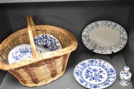 A good quality modern woven-wicker basket, of traditional design 38cm sold along with a selection of