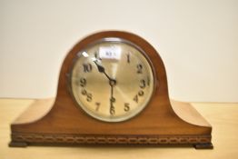 A vintage Lepps Bury inlaid mantel clock, having pendulum.