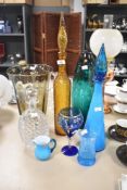 A Holmegaard elongated green glass ovoid vase, etched signature to base sold together with an