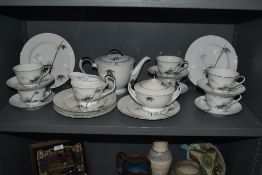 A selection of Japanese CBC China tea ware, hand decorated with a bamboo design against a white