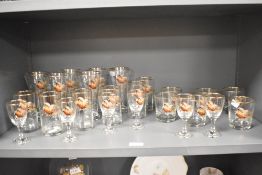 A selection of 20th Century drinking glasses with hand painted pheasant design, the largest measures