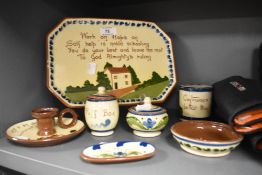 A selection of early 20th Century Torquay motto ware, to include a 'Work on Hope' octagonal tray,