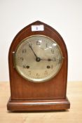 An early 20th Century mahogany cased mantel clock by New Haven, of lancet form with boxwood inlay,