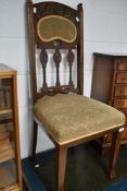 A Victorian oak high back dining chair having overstuffed seat and back panel, with moquette