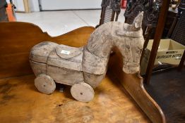 A modern or vintage wooden Trojan style horse ornament, height approx. 39cm