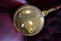 A traditional warming pan