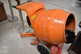 An electric cement mixer, Belle Minimix 150, in very clean condition having had little or no use