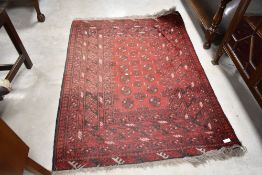 A Persian style rug, having red ground, approx. 130 x 100cm