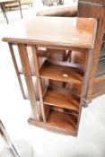 An Edwardian mahogany and inlaid revolving bookcase, approx. 51 x 51cm, height 105cm
