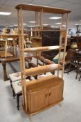 A vintage Ercol light elm 'Giraffe' room divider