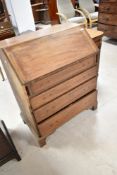 A part stripped mahogany bureau for restoration
