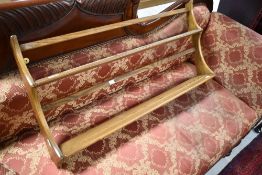 An Ercol plate shelf, width approx. 96cm