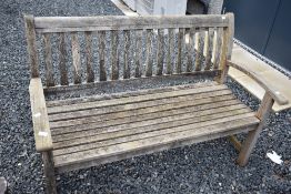 A wooden garden bench, width approx. 139cm