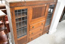 An early 20th oak side by side bureau bookcase, width approx. 127cm