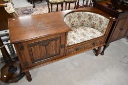 An Old Charm style oak telephone seat , width approx. 124cm