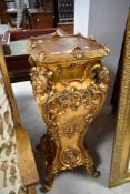 A reproduction ornate gilt work jardinere stand, height approx. 104cm