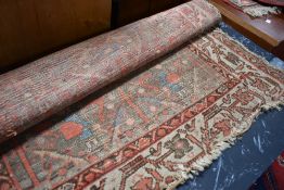 Two vintage rugs, quite faded