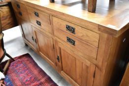 A modern oak sideboard, width approx. 166cm, depth 57cm, height 90cm