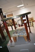 An Eastern brass topped occasional table and tapestry footstool
