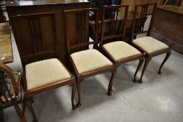 A set of four Edwardian mahogany dining chairs