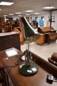 A vintage Herbert Terry style anglepoise lamp in military green