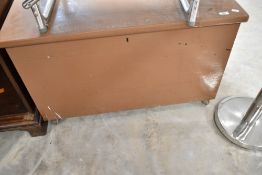 A traditional painted pine bedding chest and contents