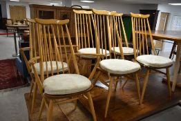 A set of six (four plus two) light Ercol Goldsmith style dining chairs