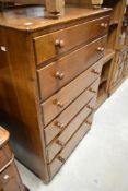A vintage oak and ply bedroom chest of six long drawers, dimensions approx. W76 D47 H120cm