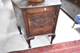A period oak composite side cabinet