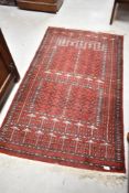 A Persian style rug having burgundy ground, approx. 153 x 92cm