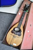 A traditional bowl back Neopolitan mandolin, with label for Luigi Mario Dosio, Napoli, in shaped