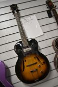 A vintage Harmony H51 archtop hollowbody electric guitar with Gibson P-13 pick up, part of the