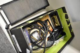 A selection of various parts including guitar pickup, footrest, mandolin strings, strap, tailpiece