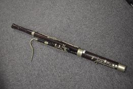 An early 20th Century Boosey & Co rosewood bassoon , serial number 21596, circa 1915