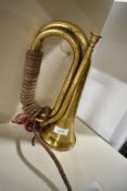 A traditional brass bugle