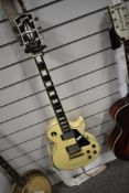 A 2012 Les Paul Custom electric guitar , serial number 120620479 (volume and tone knobs