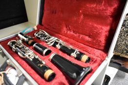 A Boosey & Hawkes regenct clarinet, in fitted case