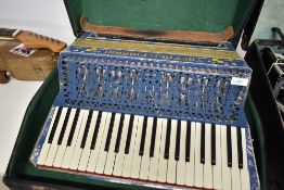 A vintage Toffoli & Fiorani Piano accordion, with case
