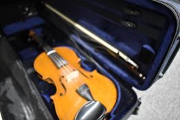 A traditional violin and bow in fitted foam case, unlabelled