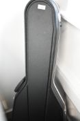 A Hiscox acoustic style guitar case