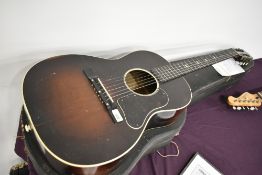 An early Martin Coletti flat top acoustic guitar, labelled G40, with case labelled Alan