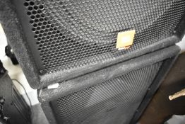 A pair of JBL SF15 speakers