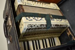 A Hohner piano accordion in hard case