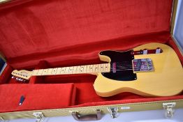 A Fender 52 reissue Telecaster electric guitar in butterscotch blonde finish, with yellow tweed hard