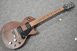 An Epiphone Les Paul Studio . Serial number EE080302696, in unfitted hard case